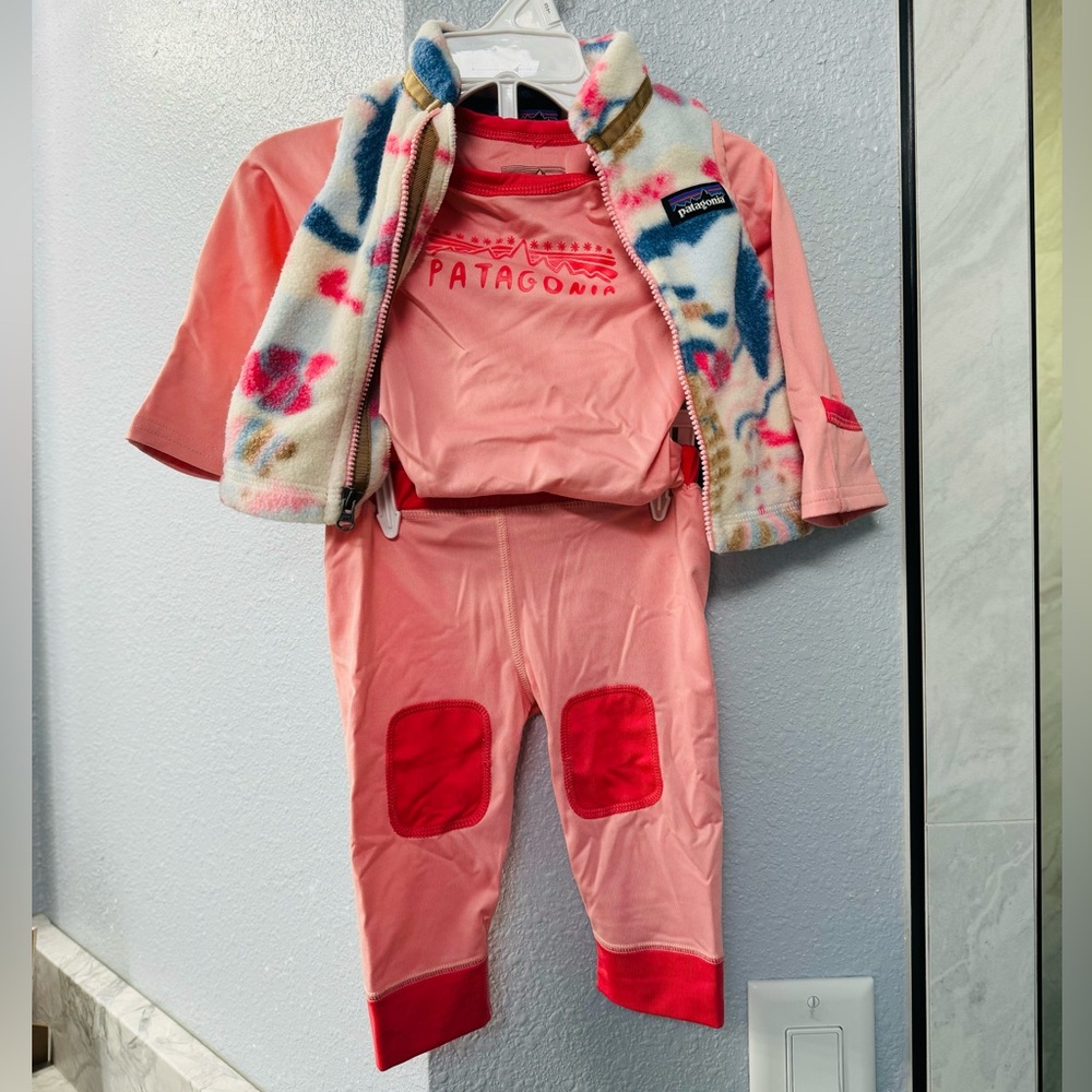 Patagonia 3 piece set. Worn once. Like new condition. Size 3-6 months